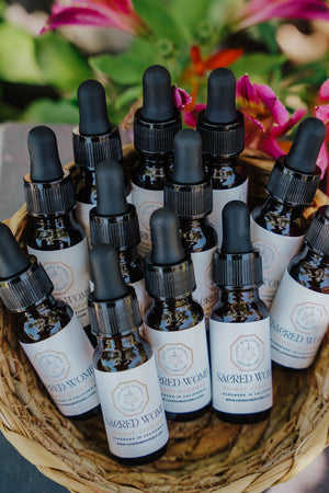 Sacred Womb Flower Essence blend for sacral chakra healing, womb wellness, emotional release, and creative awakening - Love More Divinely