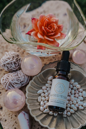 Flower essence for womb healing, feminine lineage healing, feminine embodiment, emotional balance, and spiritual transformation - Love More Divinely